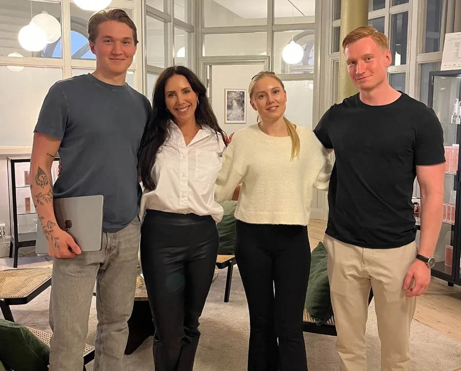Lisa Larsson of GLLOW with the Glow Marketing team in her clinic